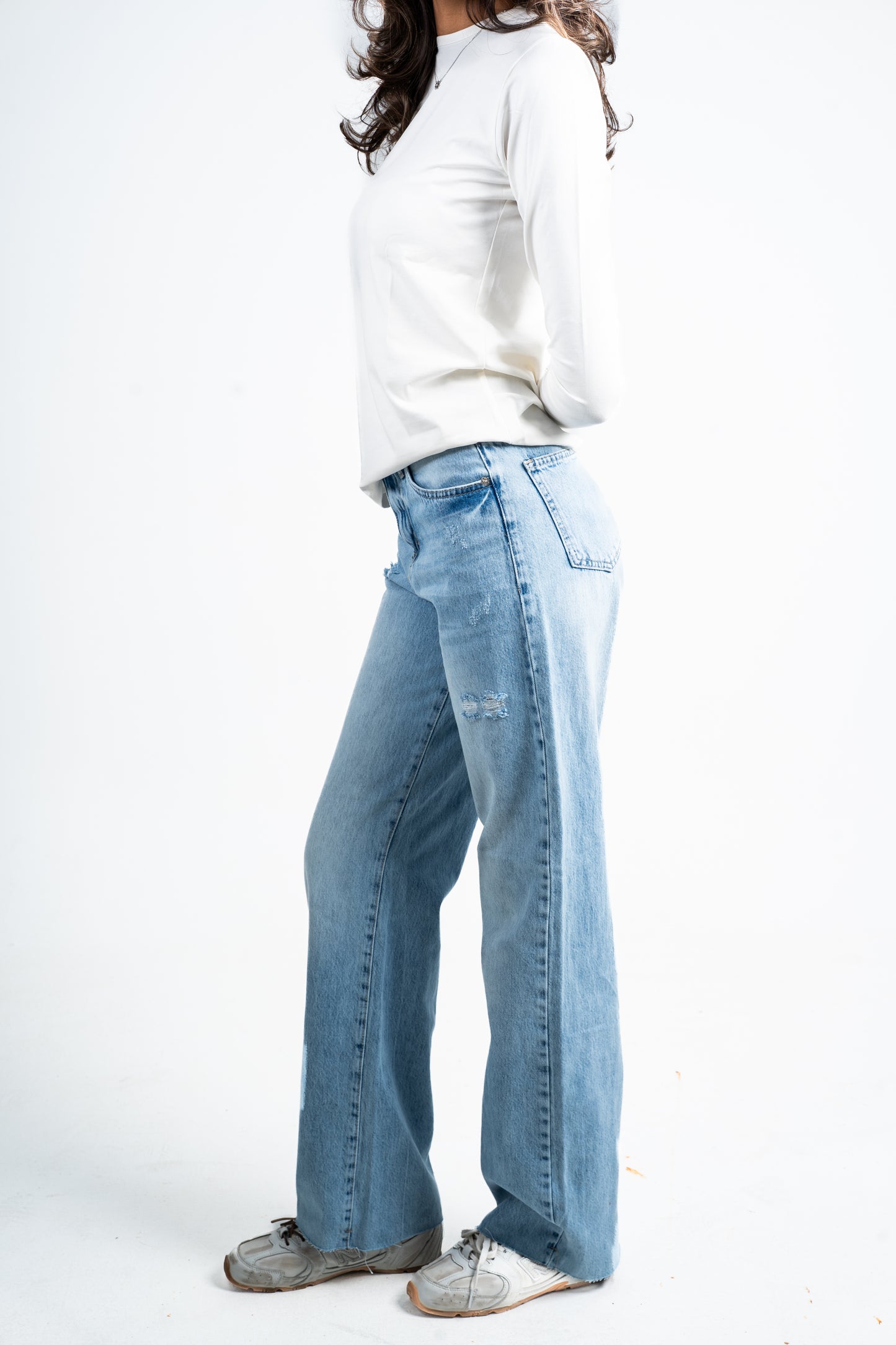 Straight unfinished jeans.