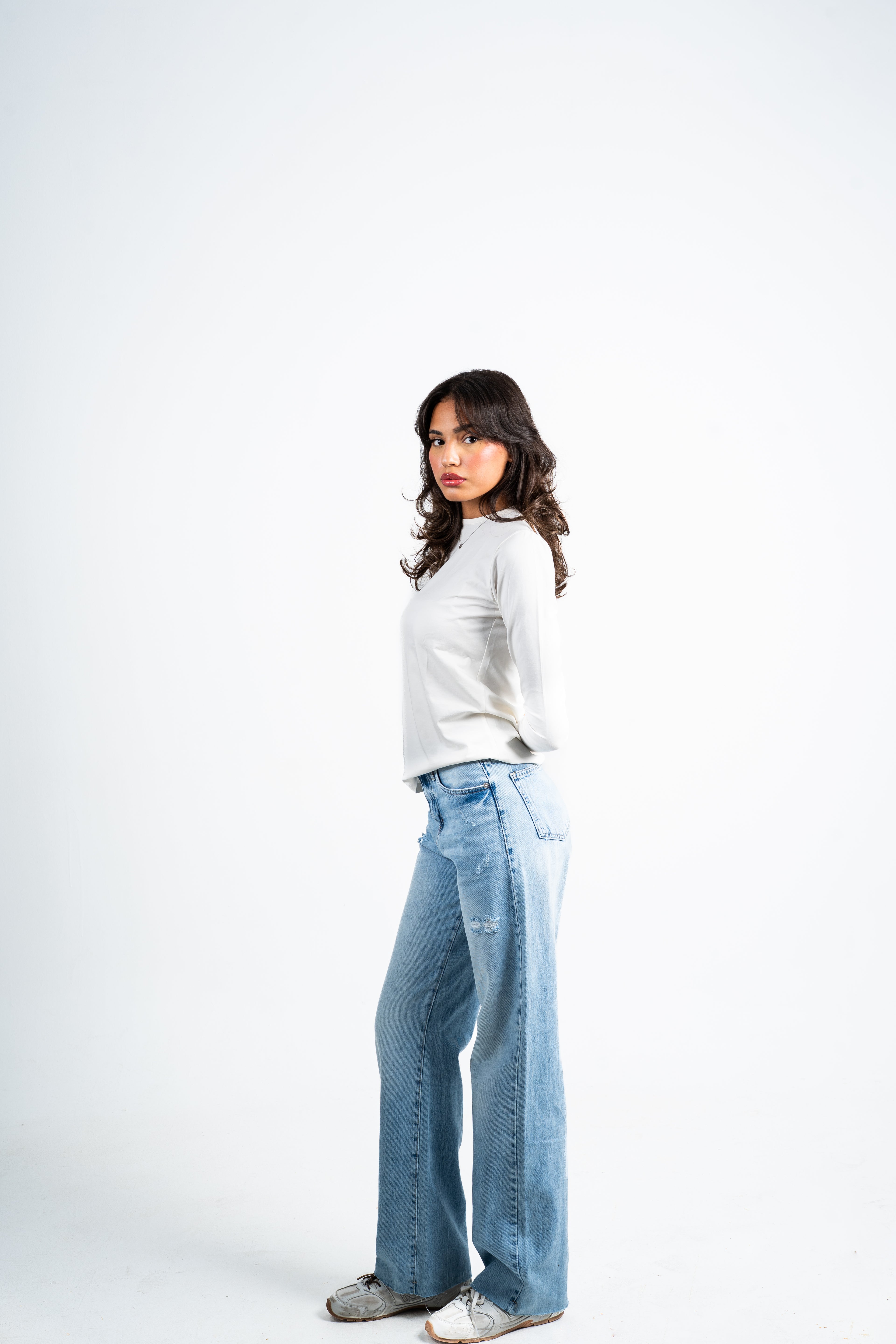 Straight unfinished jeans.